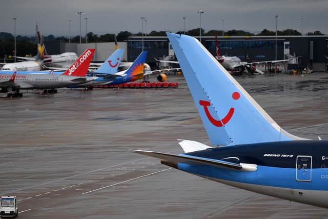 A TUI aircraft at Manchester Airport. Photo: Anthony Devlin/AFP via Getty Images