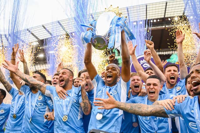 Fernandinho lifted the Premier League trophy in his final appearance for Manchester City. Credit: Getty.