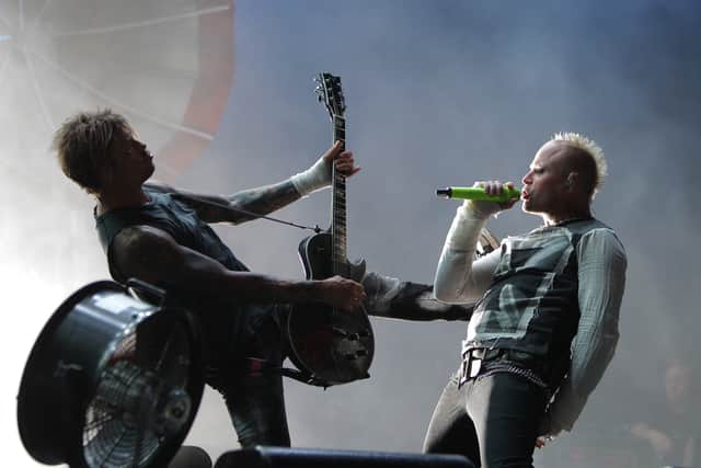 The Prodigy will pay tribute to former bandmate Keith Flint (right) who died suddenly in 2019. 