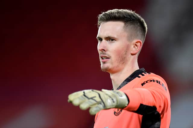 Dean Henderon’s rise partly led to Sergio Romero’s departure in 2021. Credit: Getty.