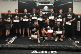 Veterans with their certificates after completing the BoxWise programme