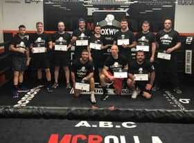 Veterans with their certificates after completing the BoxWise programme