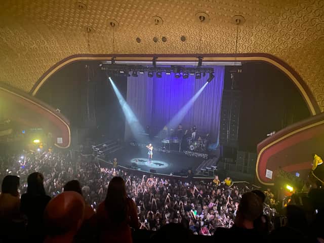 Olivia Rodrigo performing to a packed-out Apollo Manchester.