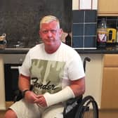 David Judd says he was pushed in his wheelchair off a plane by a pilot after support staff failed to arrive