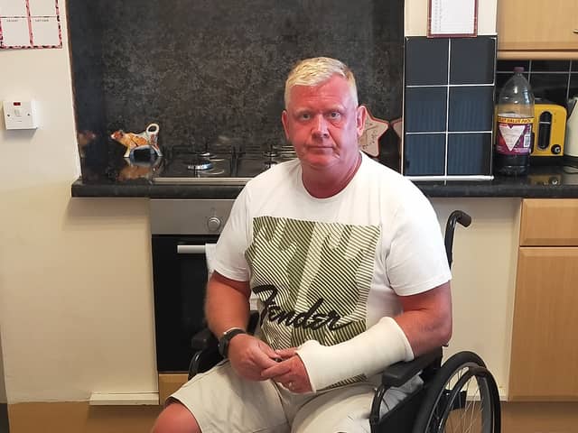 David Judd says he was pushed in his wheelchair off a plane by a pilot after support staff failed to arrive