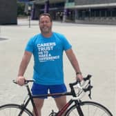 Andrew Crompton is riding from Manchester to Melbourne for charity. Photo: Carers Trust