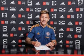 Lisandro Martinez signs Manchester United contract.