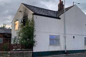 The fire broke out in the former Woodman pub in London Road, Hazel Grove Credit: Greater Manchester Fire and Rescue