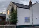 The fire broke out in the former Woodman pub in London Road, Hazel Grove Credit: Greater Manchester Fire and Rescue