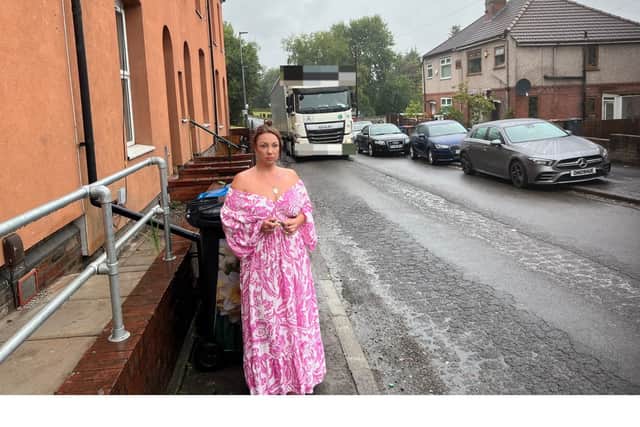Emma Martin outside her Salford home Credit: LDRS