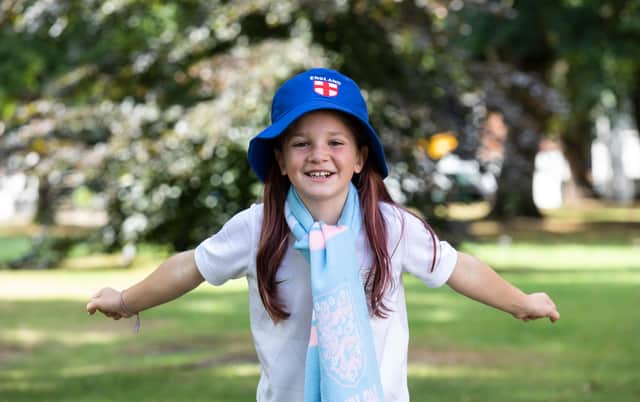 Tess Dolan, 8, has become an Internet sensation after being filmed dancing at the England Womens semi Credit: SWNS