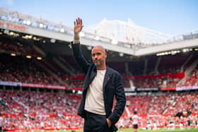 Erik ten Hag waves to the Manchester United fans at Old Trafford. Credit: Getty.
