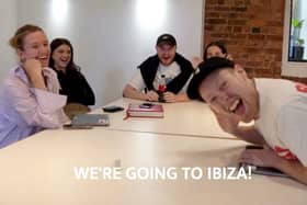 Ashley Jones (R) telling his employees that he’s taking them to Ibiza as a reward for their hard work Credit: via SWNS