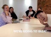 Ashley Jones (R) telling his employees that he’s taking them to Ibiza as a reward for their hard work Credit: via SWNS