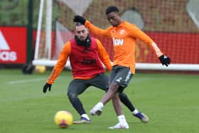 Alex Telles and Amad are among those named by Fabrizio Romano. Credit: Getty.