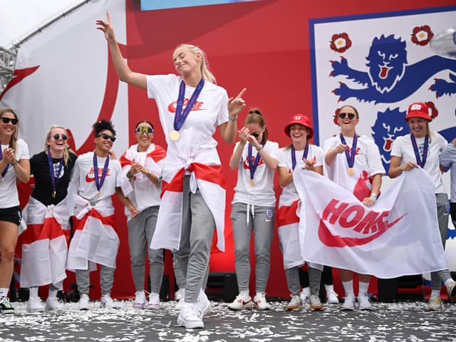 Man City and England star Chloe Kelly celebrates with the Lionesses in Trafalgar Square on Monday Credit: Getty