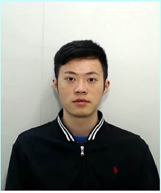 Yuming Dong, aged 21, a former engineering student in Manchester, has been convicted of money laundering Credit: BTP