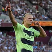 Manchester City’s Norwegian striker Erling Haaland celebrates after scoring their second goal against West Ham United (Photo by JUSTIN TALLIS/AFP via Getty Images)