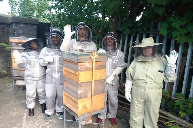The team of apiarists at Bee Corner