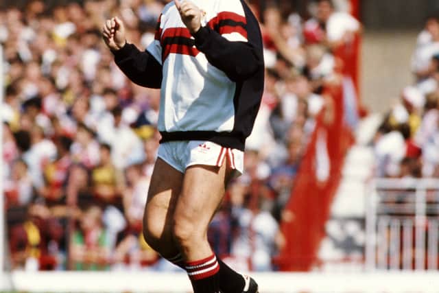 Michael Knighton pictured juggling a football at Old Trafford in 1989. Credit: Getty.