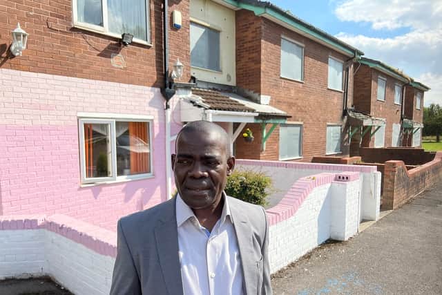 Demonique Wilson outside his Salford home Credit: LDRS