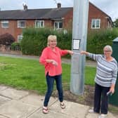 Veronica Atkin and Denise Roof with 6G mast in Cheadle. Image: LDRS. 