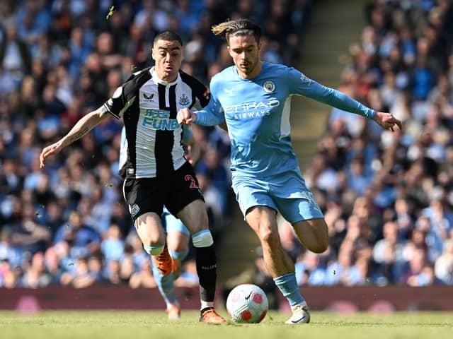 Newcastle United’s Miguel Almiron vies with Manchester City star Jack Grealish  (Photo by PAUL ELLIS/AFP via Getty Images)