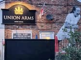 Mural of England Lionesses forward Ella Toone painted on the side of the Union Arms pub in her hometown of Tyldesley Credit: swns