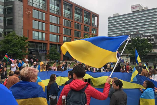 Ukrainians in Manchester gather in Piccadilly Gardens for their weekly anti-war protests. Credit: Sofia Fedeczko