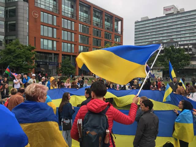 Ukrainians in Manchester gather in Piccadilly Gardens for their weekly anti-war protests. Credit: Sofia Fedeczko