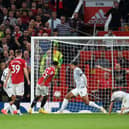 Jadon Sancho puts Manchester United ahead against Liverpool  (Photo by Michael Regan/Getty Images)