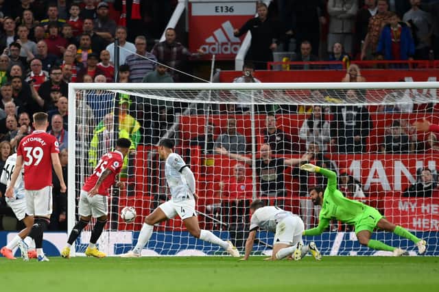Jadon Sancho puts Manchester United ahead against Liverpool  (Photo by Michael Regan/Getty Images)