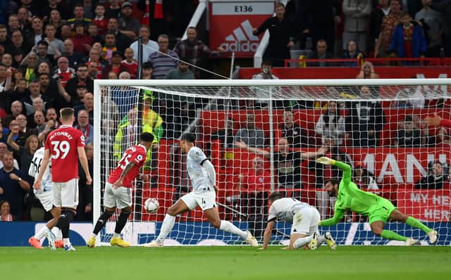 Jadon Sancho puts Manchester United ahead against Liverpool (Photo by Michael Regan/Getty Images)