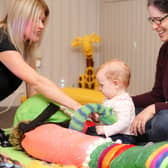 Businesswoman Victoria Jennings interacts with mother and baby during one of her Bloom Baby sensory classes. Credit: Bloom Baby