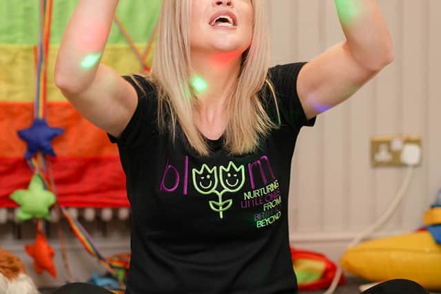 Franchisor Victoria Jennings leads a baby sensory class. Credit: Bloom Baby