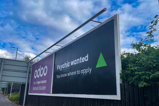 The billboard searching for a psychic which has appeared on a Manchester street