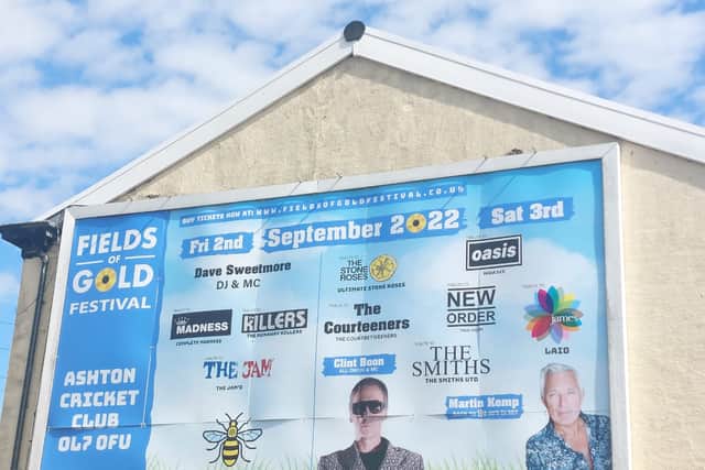 A billboard in Tameside advertising the Fields of Gold festival at Ashton Cricket Club. Credit: Sofia Fedeczko/Manchester World 