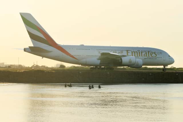 An Emirates plane Credit: Getty