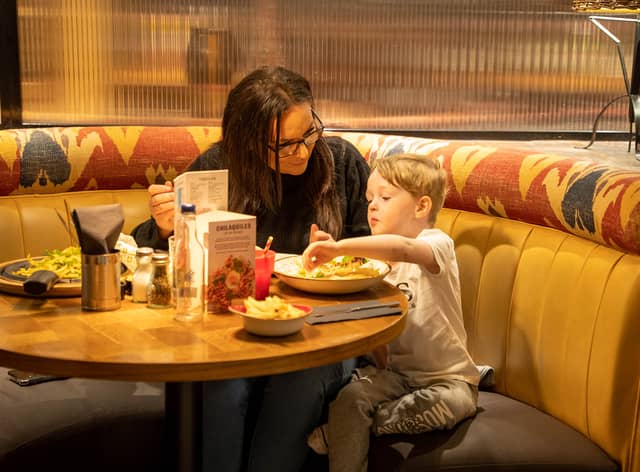 Mother and son enjoy brunch at the Printworks. Credit: The Printworks