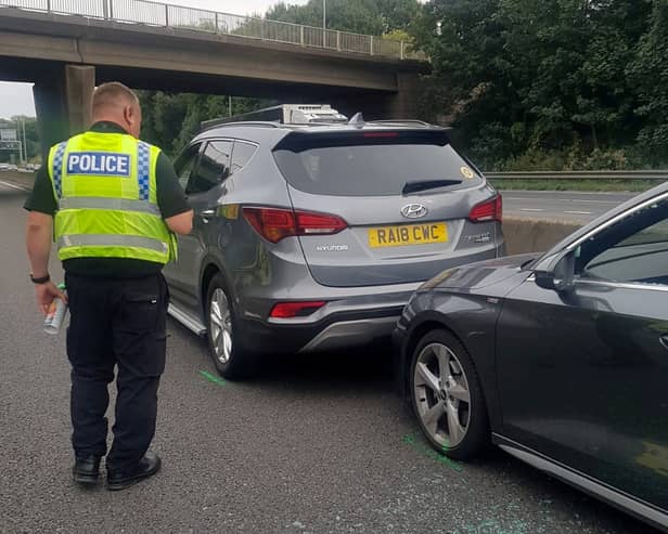 John Barlow placed his Hyundai Santa Fe SUV in front of the stricken Audi on the M62 Credit: SWNS