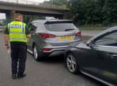 John Barlow placed his Hyundai Santa Fe SUV in front of the stricken Audi on the M62 Credit: SWNS