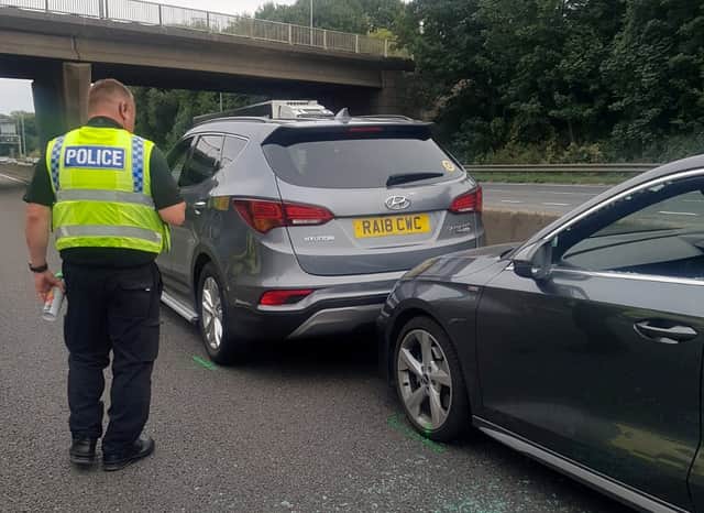 John Barlow placed his Hyundai Santa Fe SUV in front of the stricken Audi on the M62 Credit: SWNS