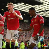 Antony celebrates with Scott McTominay and Marcus Rashford after scoring on his United debut