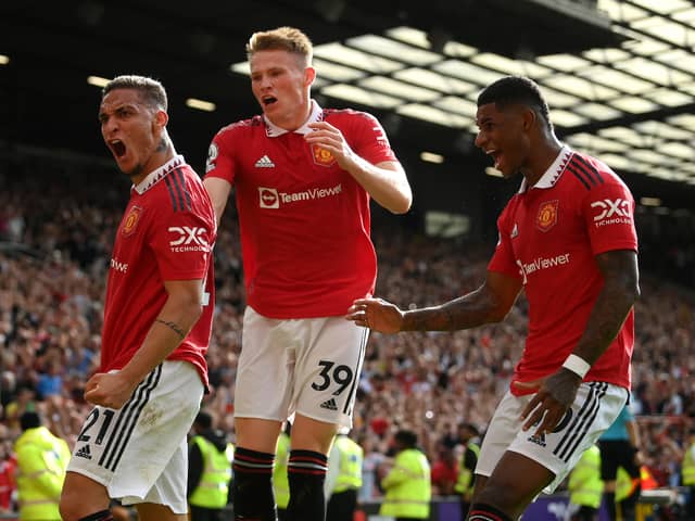 Antony celebrates with Scott McTominay and Marcus Rashford after scoring on his United debut