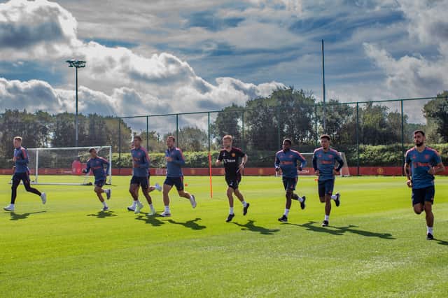 Man Utd players (left to right) Scott McTominay, Antony,  Raphael Varane, Christian Eriksen, Tyrella Malacia, Jadon Sancho and Bruno Fernandes in training ahead of their Europa League Group E fixture vs Real Sociedad