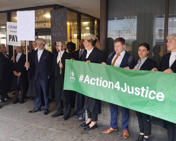 Criminal barristers on strike outside Crown Square in Manchester. Photo: David Eggboro