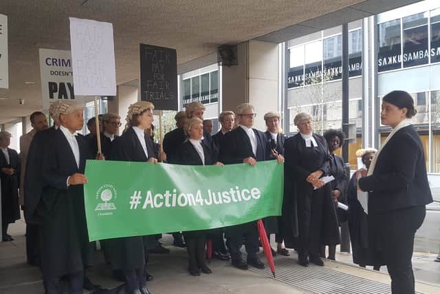 Rebecca Penfold speaking to the demonstration at Crown Square. Photo: David Eggboro