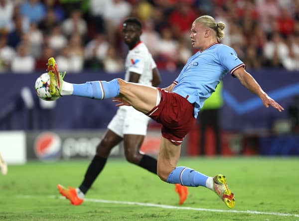 Erling Haaland scored two as Manchester City beat Sevilla 4-0.