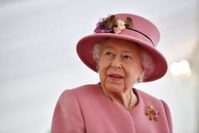 Queen Elizabeth II speaks with staff during a visit to the Defence Science and Technology Laboratory (Dstl) at Porton Down science park on October 15, 2020 near Salisbury, England. (Photo: Ben Stansall - WPA Pool/Getty Images)