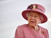 Queen Elizabeth II speaks with staff during a visit to the Defence Science and Technology Laboratory (Dstl) at Porton Down science park on October 15, 2020 near Salisbury, England. (Photo: Ben Stansall - WPA Pool/Getty Images)